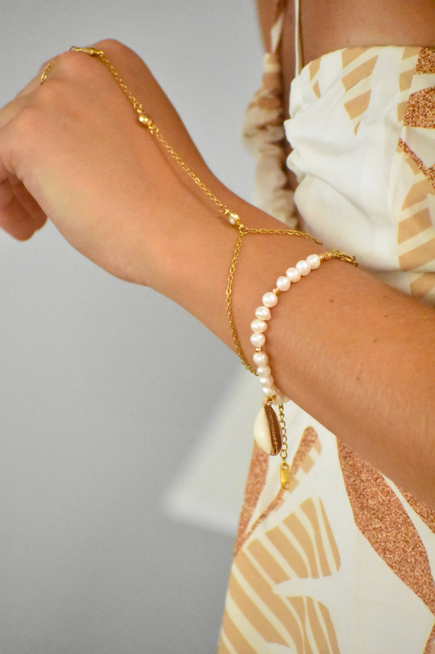 a bracelet with a ring attached