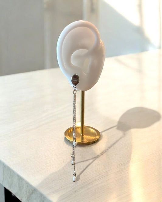 A falling earring silver long