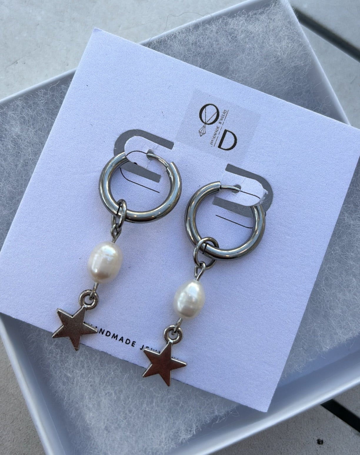 Hoop earring pearl star