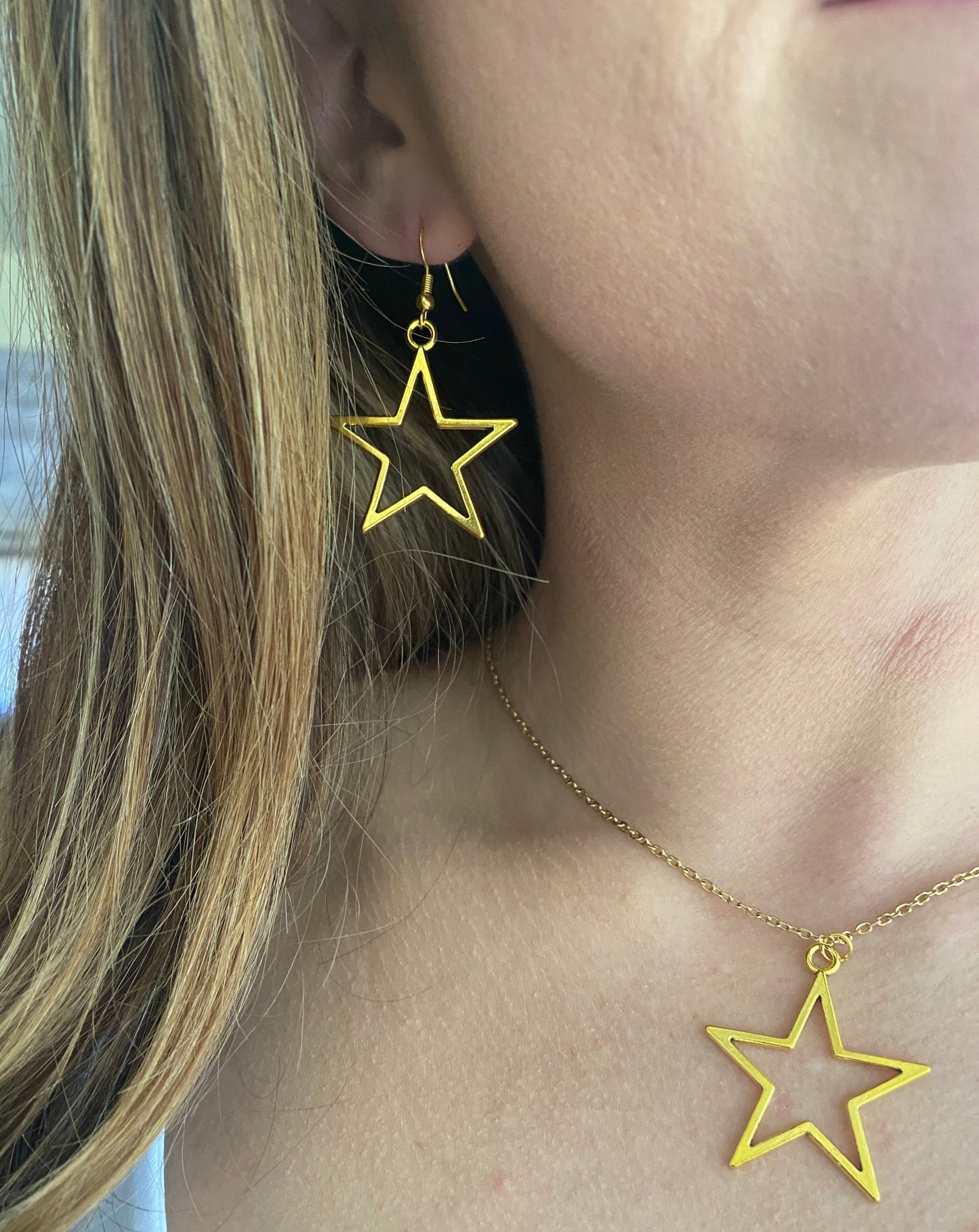 Big gold star earring