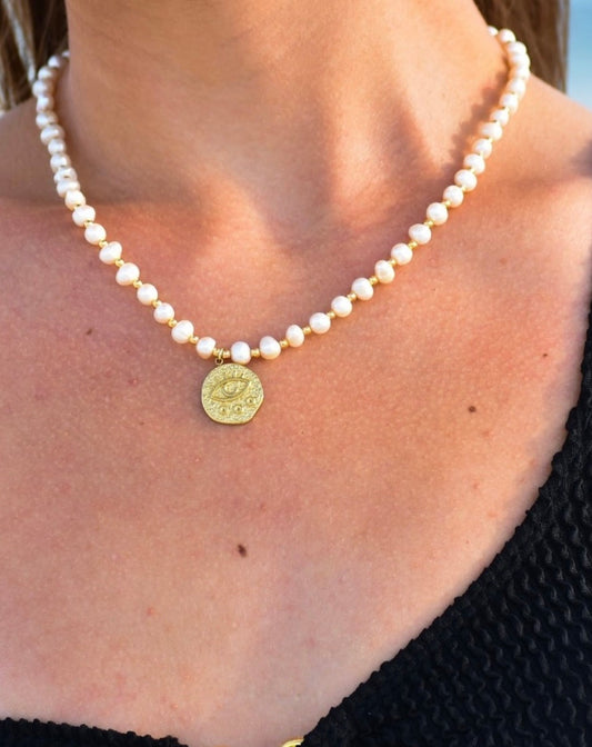 pearl necklace with gold beads & evil eye pendant