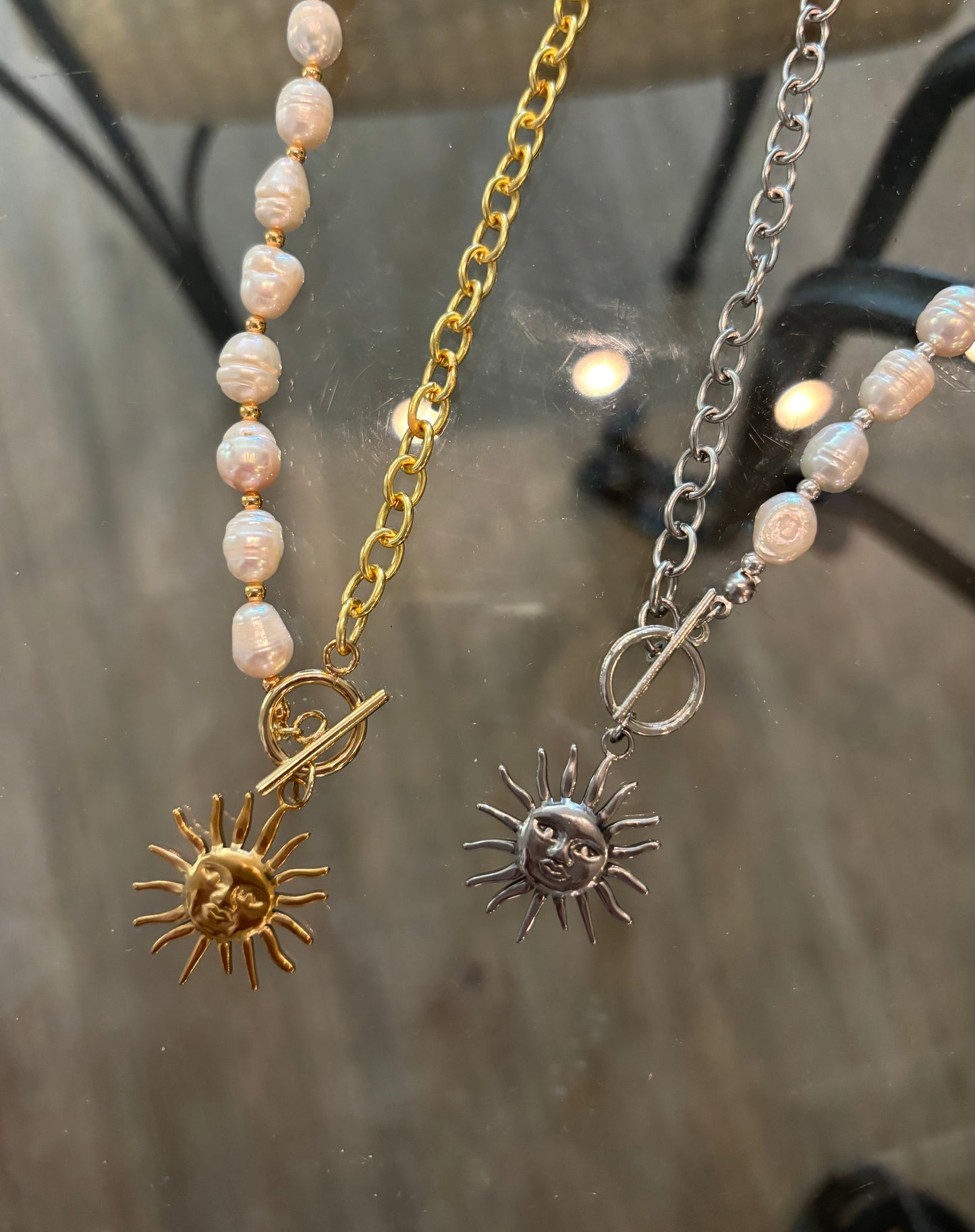 ￼ Half big chain half pearls, with sun pendant