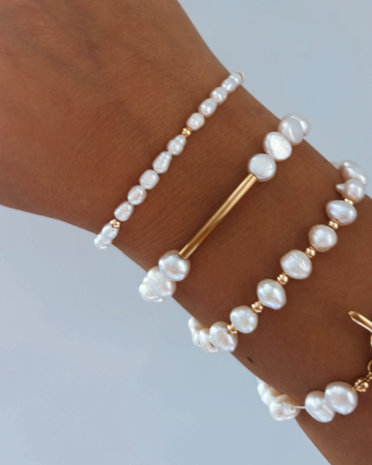 Small freshwater pearl with with gold beads